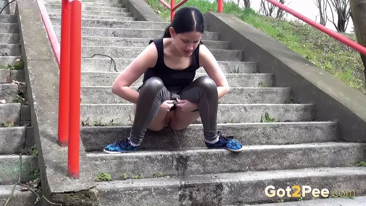 Dark Haired Girl Pisses On Concrete Steps - Pissing Outdoor - 4K 2160p - pissing porn video at PornUria